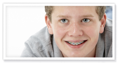 stock photo of a teen boy with braces